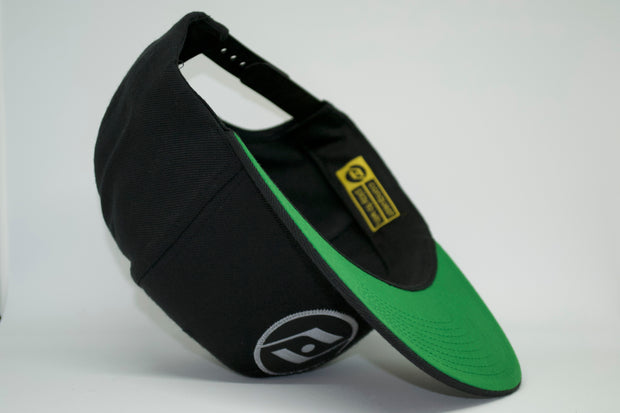 The obsession snap back (grey logo) green undervisor